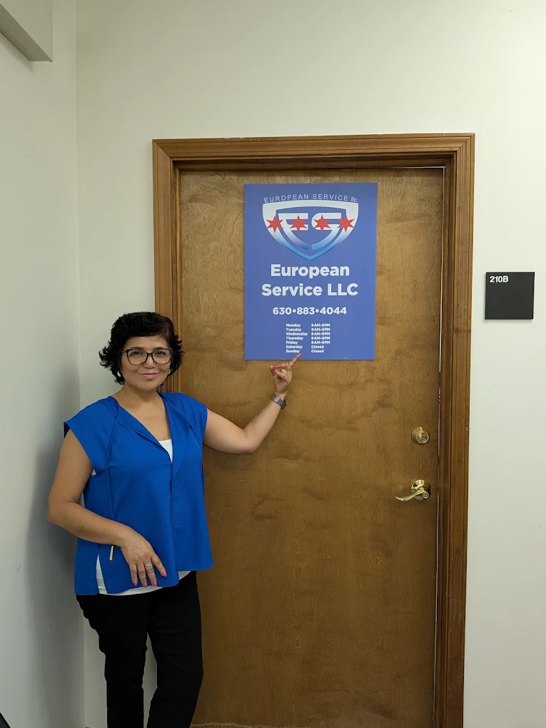 Staff member at the suite door signage of the European Service home care office in Elgin, Illinois.